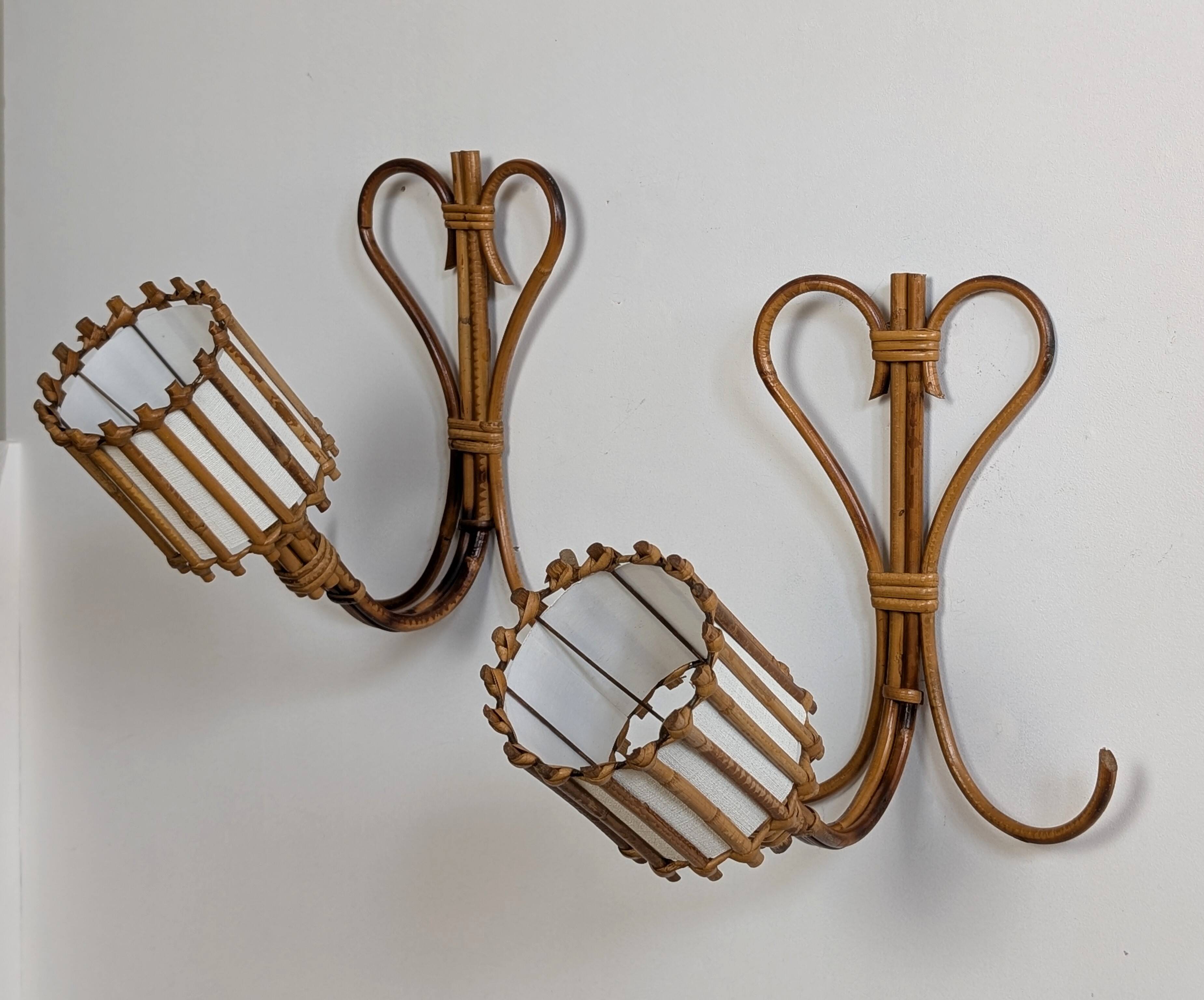 Rattan wall lights by Louis Sognot