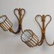 Rattan wall lights by Louis Sognot