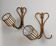 Rattan wall lights by Louis Sognot