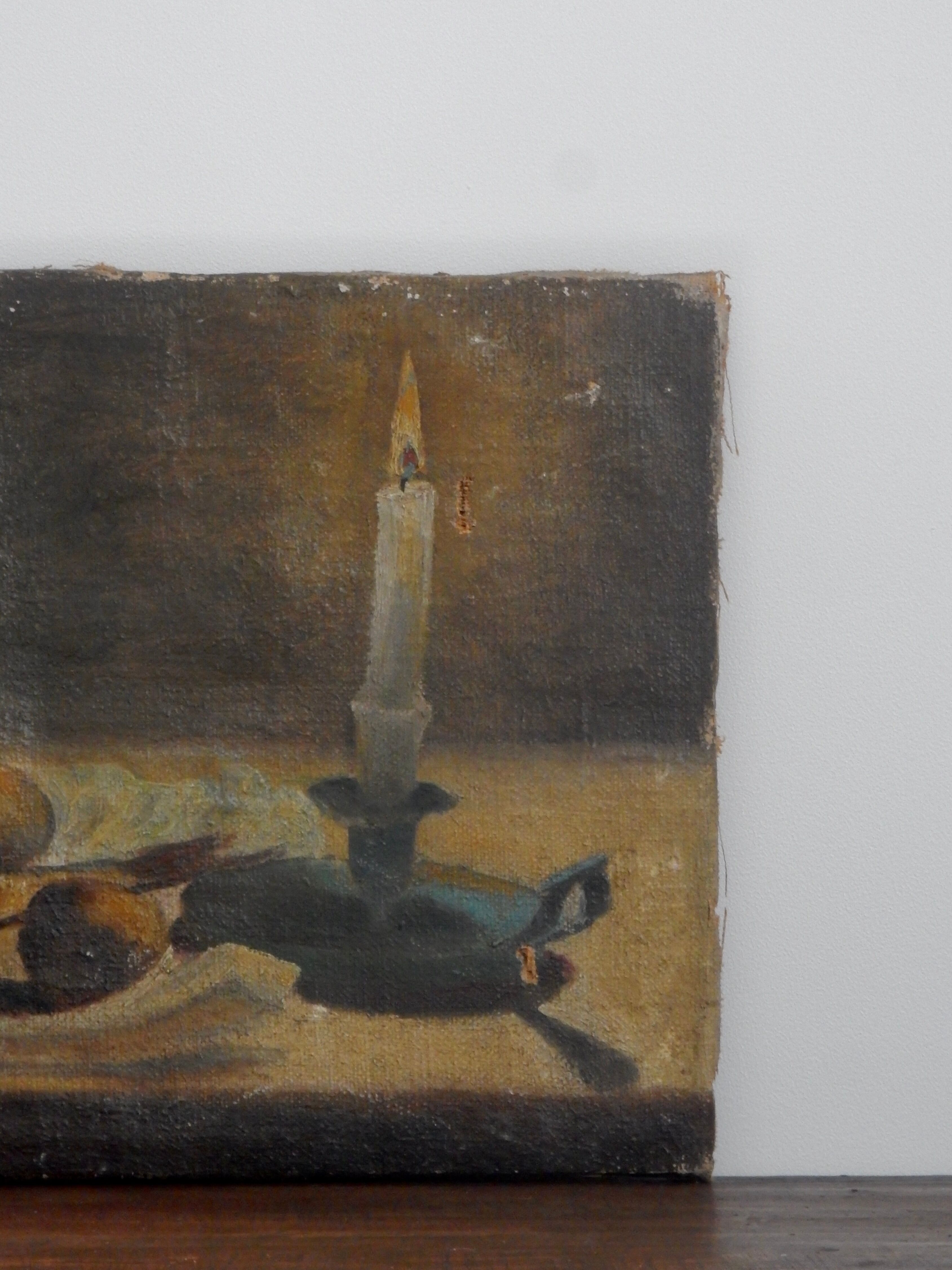 Oil on canvas still life painting lit by candlelight