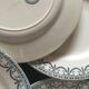 Set de 9 et 6 assiettes en faïence terre de fer de Salins début 20e décor gris vert