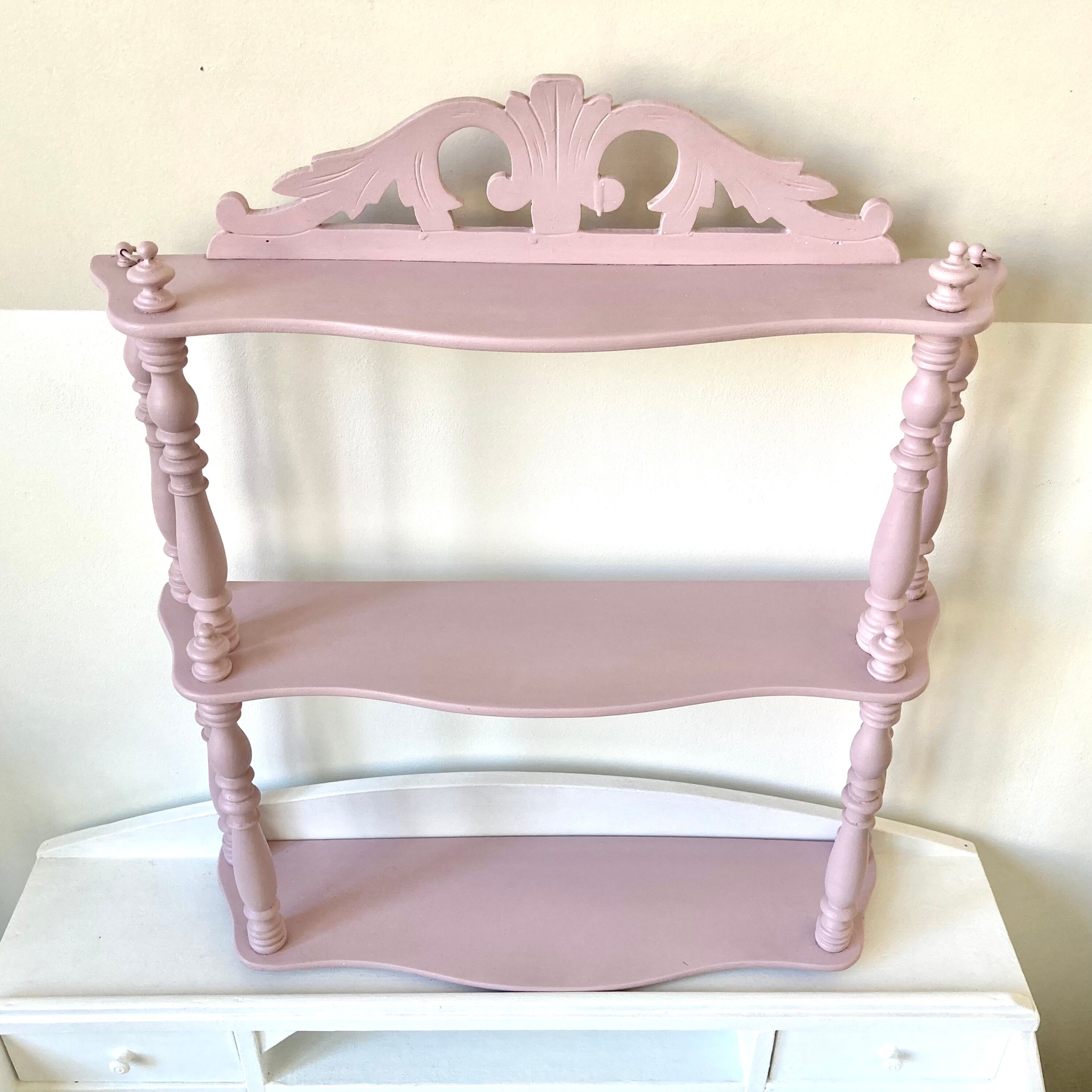 Carved wooden wall shelf