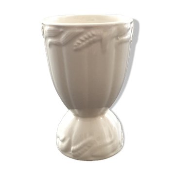 White vase with wheat decoration.