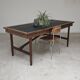 Vintage workshop folding table in oak with a hand-patinated black top.
