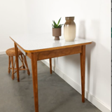 Vintage wooden dining table with formica top