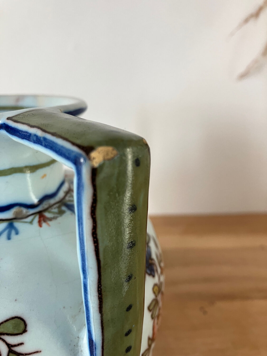 Old vase with floral motif inspired by desvres earthenware