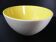 Two-tone yellow and white salad bowl, French ceramic from the 1950s.