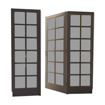 Triptych glass door with three panels featuring small panes. Vintage.