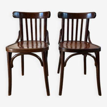 Pair of baumann bistro chairs in bent wood with early twentieth century design