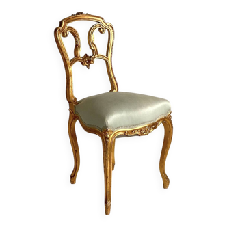 Carved and gilded wooden chair, Napoleon III period.