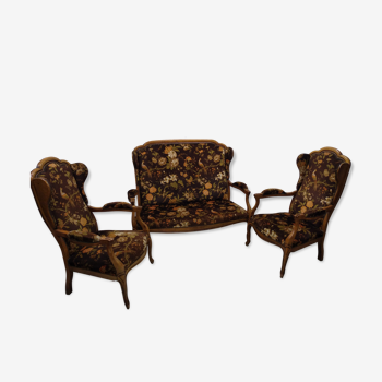 Antique eared sofa with two Louis XV style armchairs