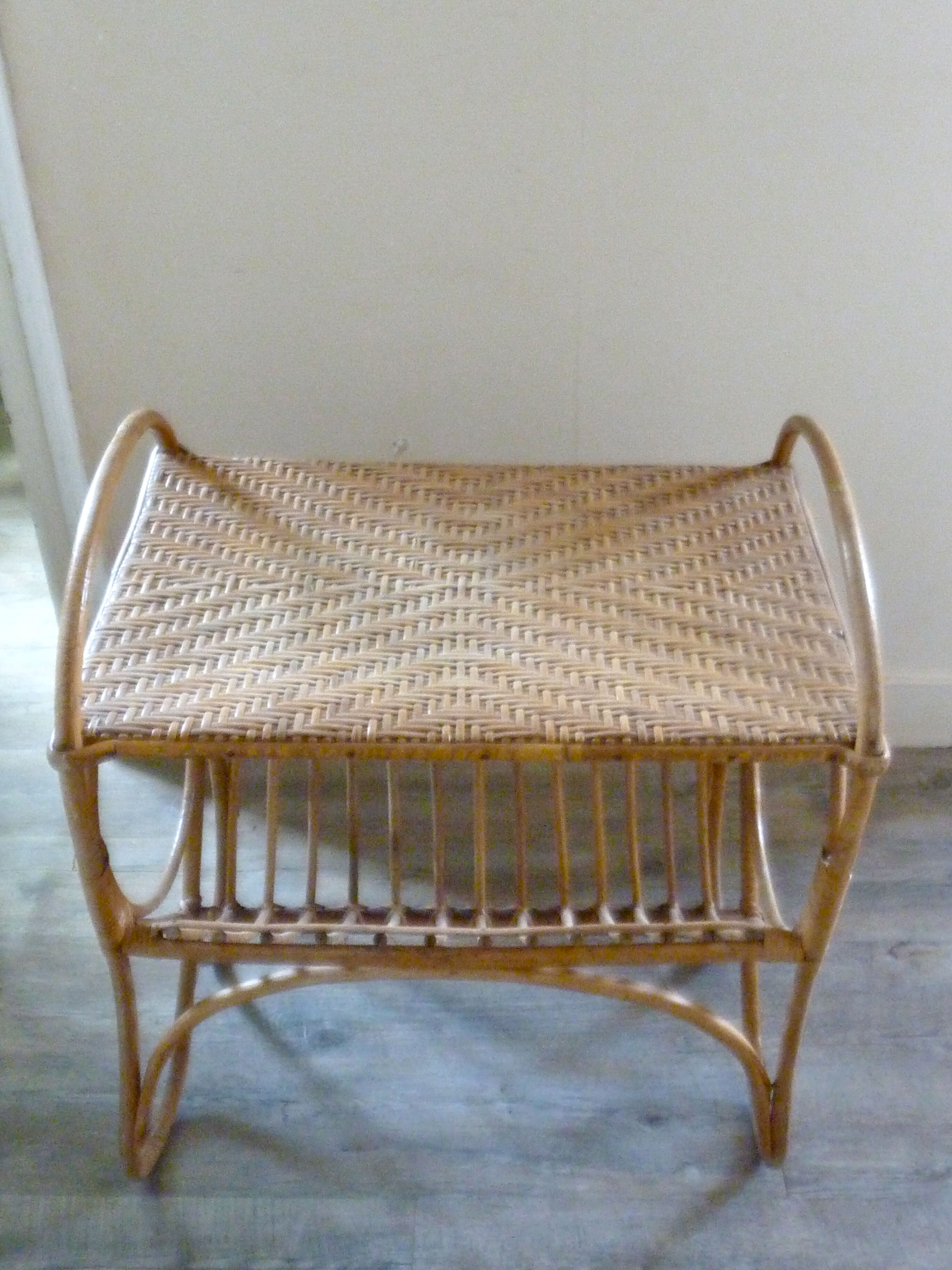 Rattan side table with range records or journals