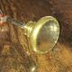 Sublime door handle made of brass with a bevelled mirror front.