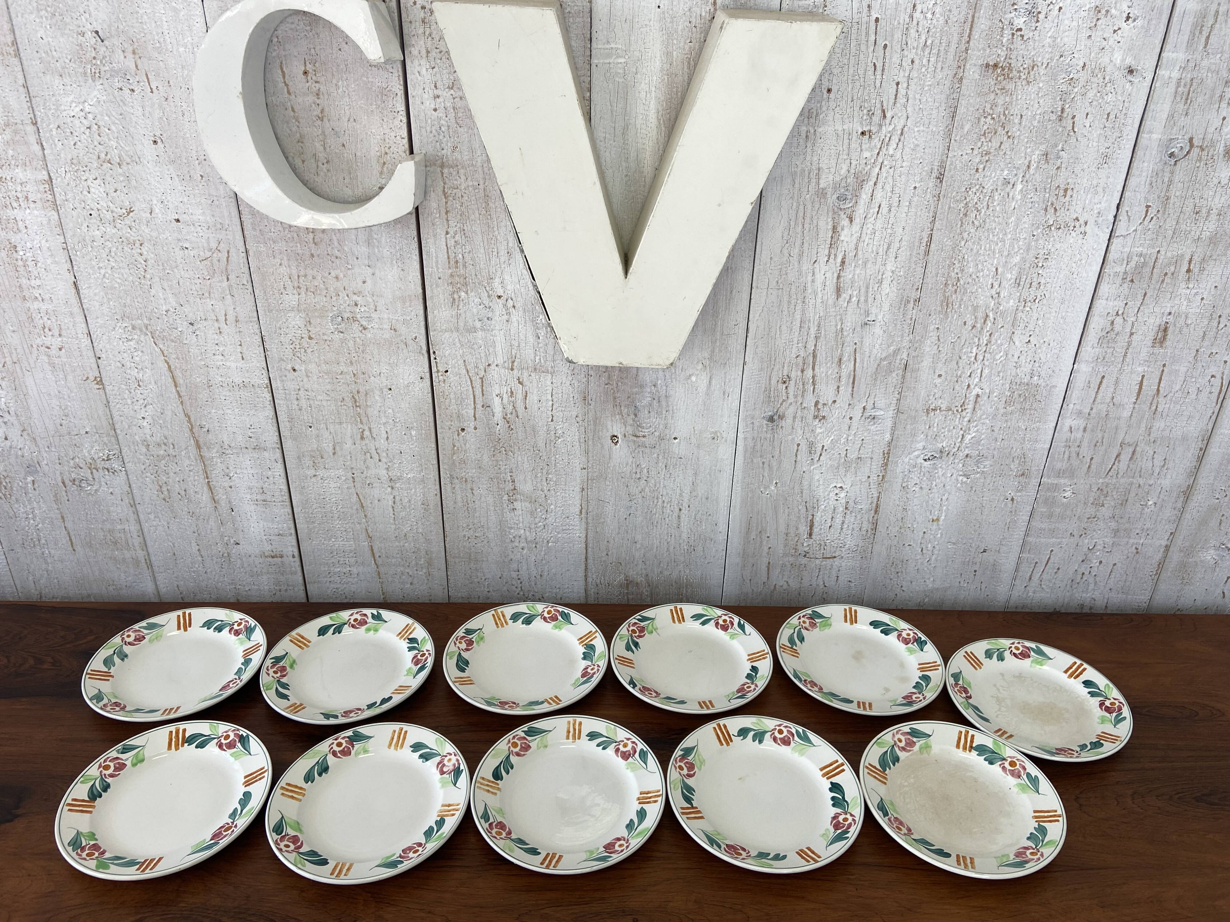 set of 8+3 St Amland plates