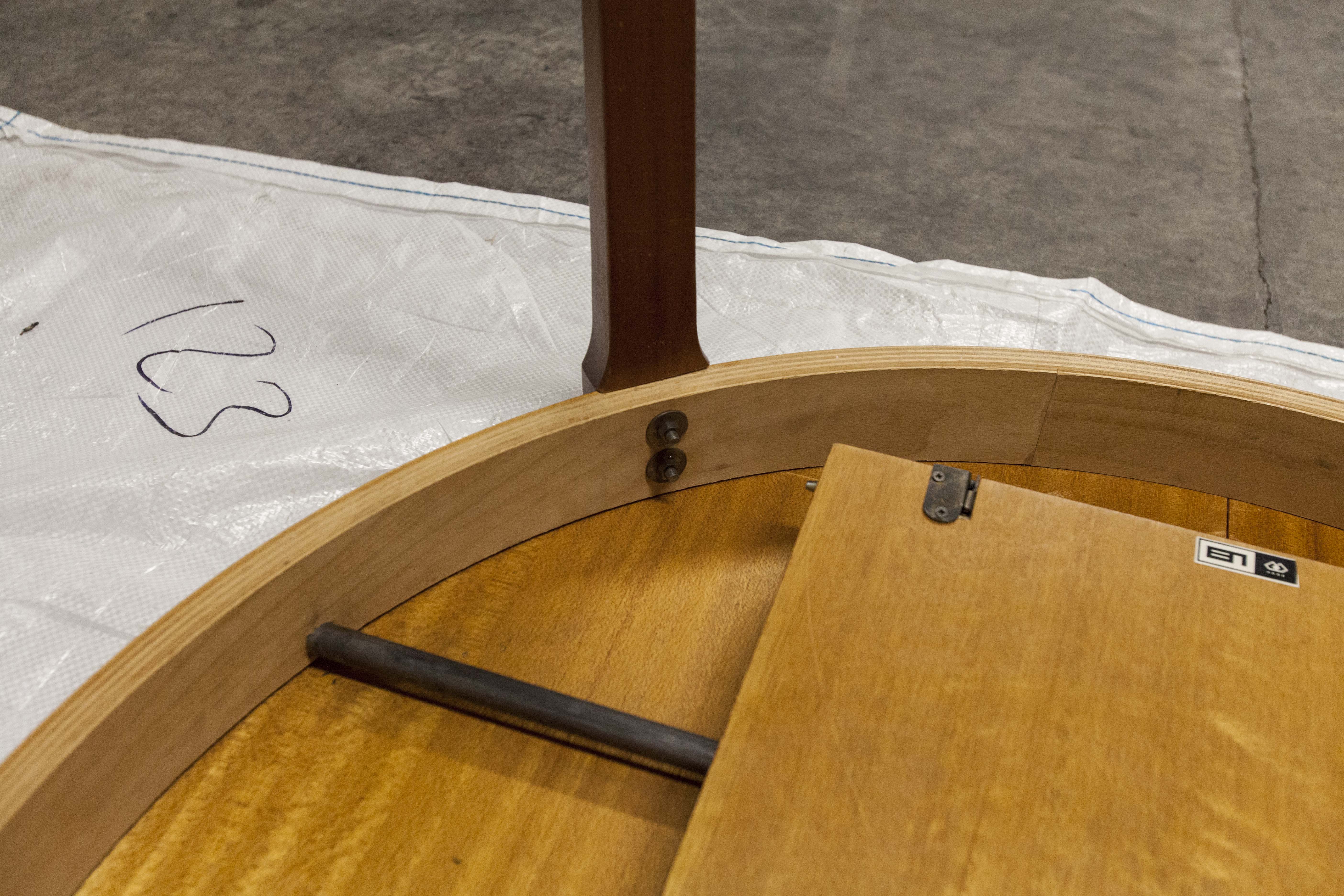 Scandinavian table in round teak with built-in extensions 1960