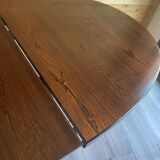 Extendable oval table Baumann, for up to 12 place settings.