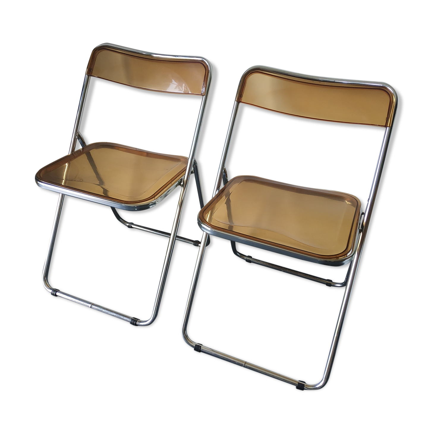 Seventies stainless steel and caramel chairs