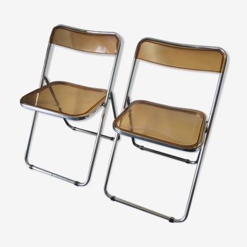 Seventies stainless steel and caramel chairs