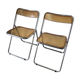 Seventies stainless steel and caramel chairs