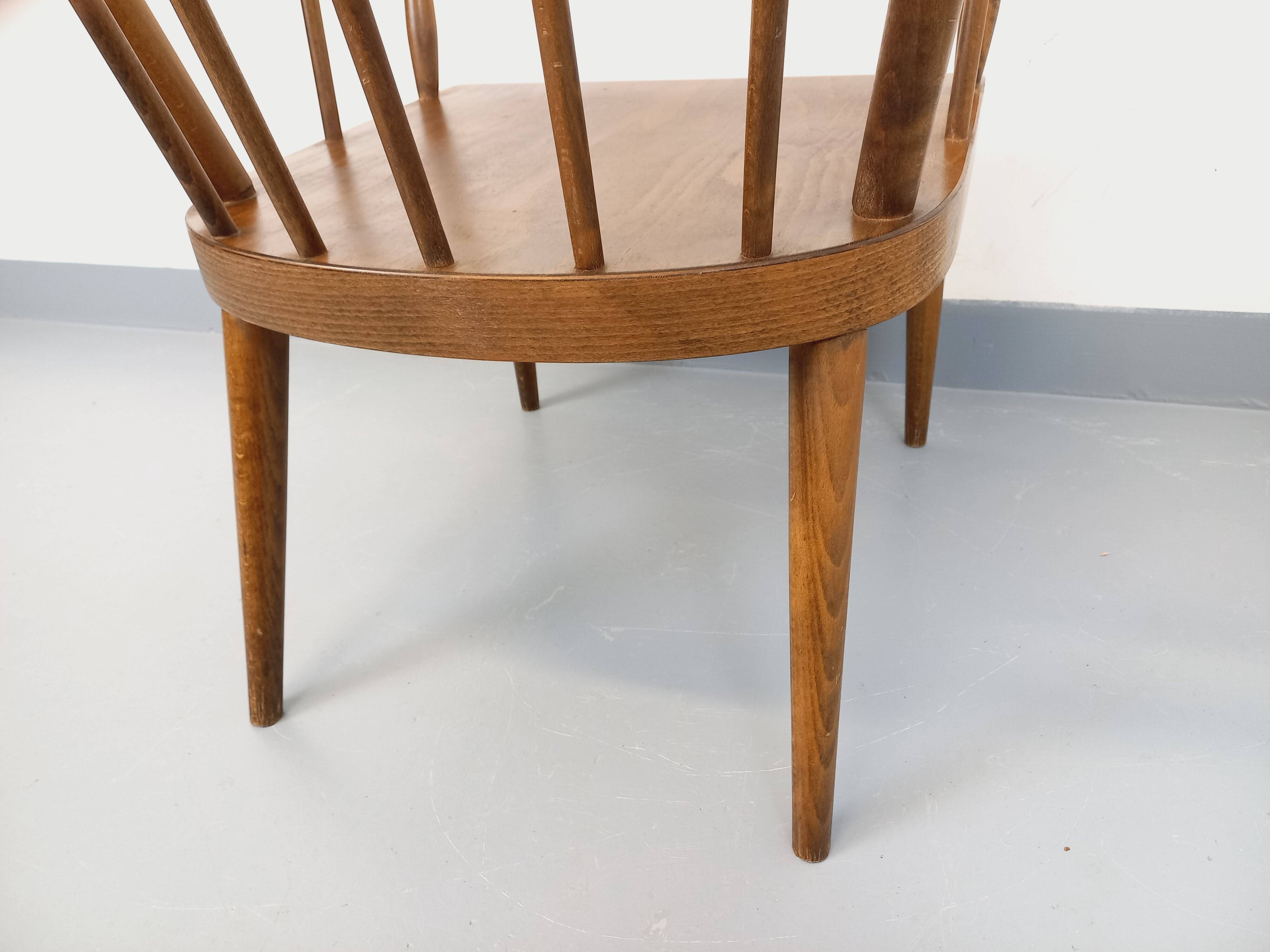 Vintage wooden armchair Baumann model Éventail from the 1960s.