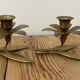 Pair of brass flower candlesticks