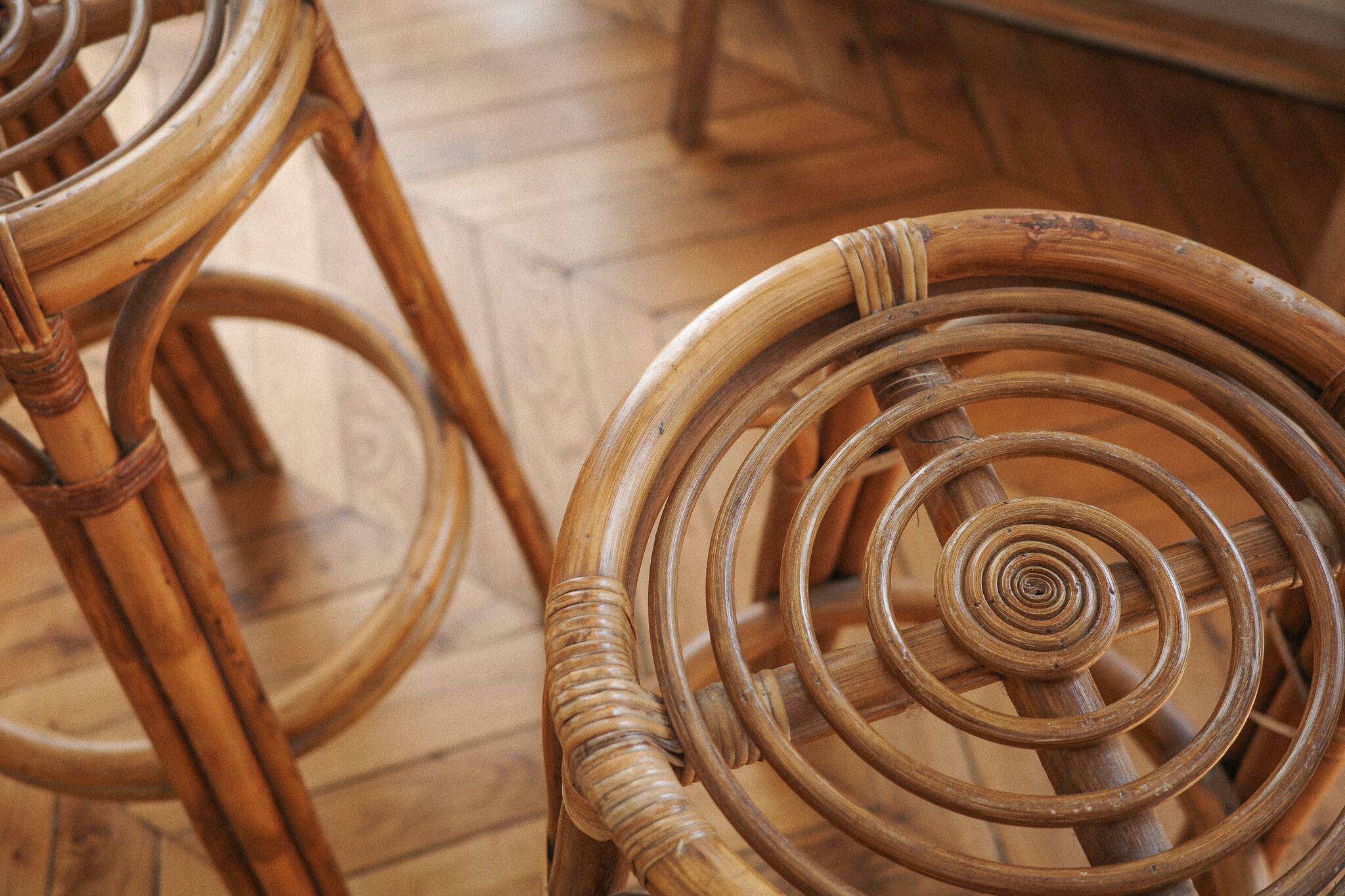 Pair of Louis Sognot bar stool in rattan 1950