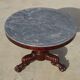 Empire guéridon in mahogany and marble, revolving top.