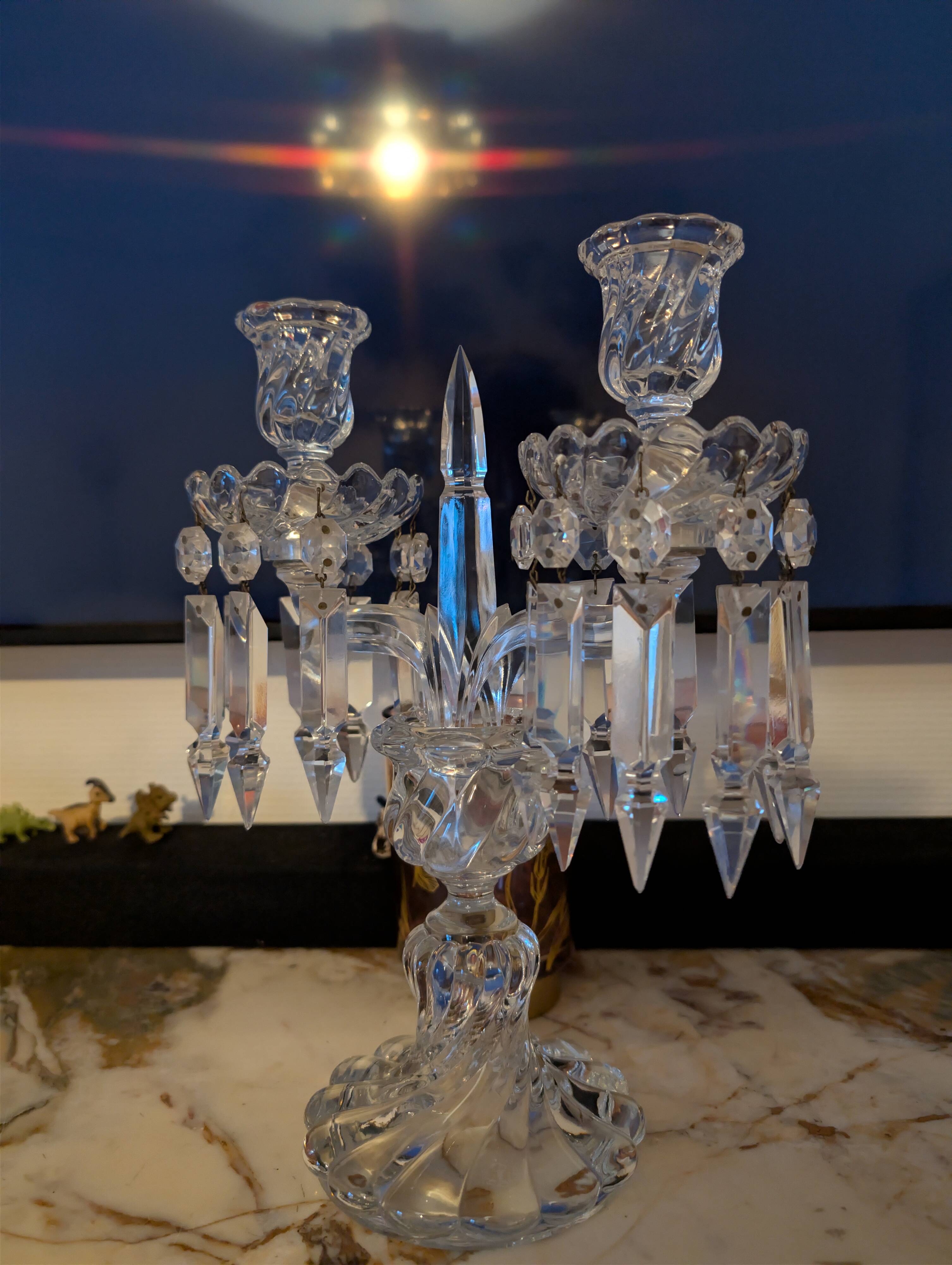 Two-light candelabrum in crystal with Baccarat pendants.