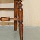 Victorian walnut dressing table chair from around 1880 with a medallion on the backrest.