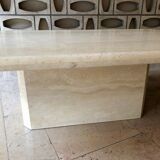 Light-colored travertine coffee table