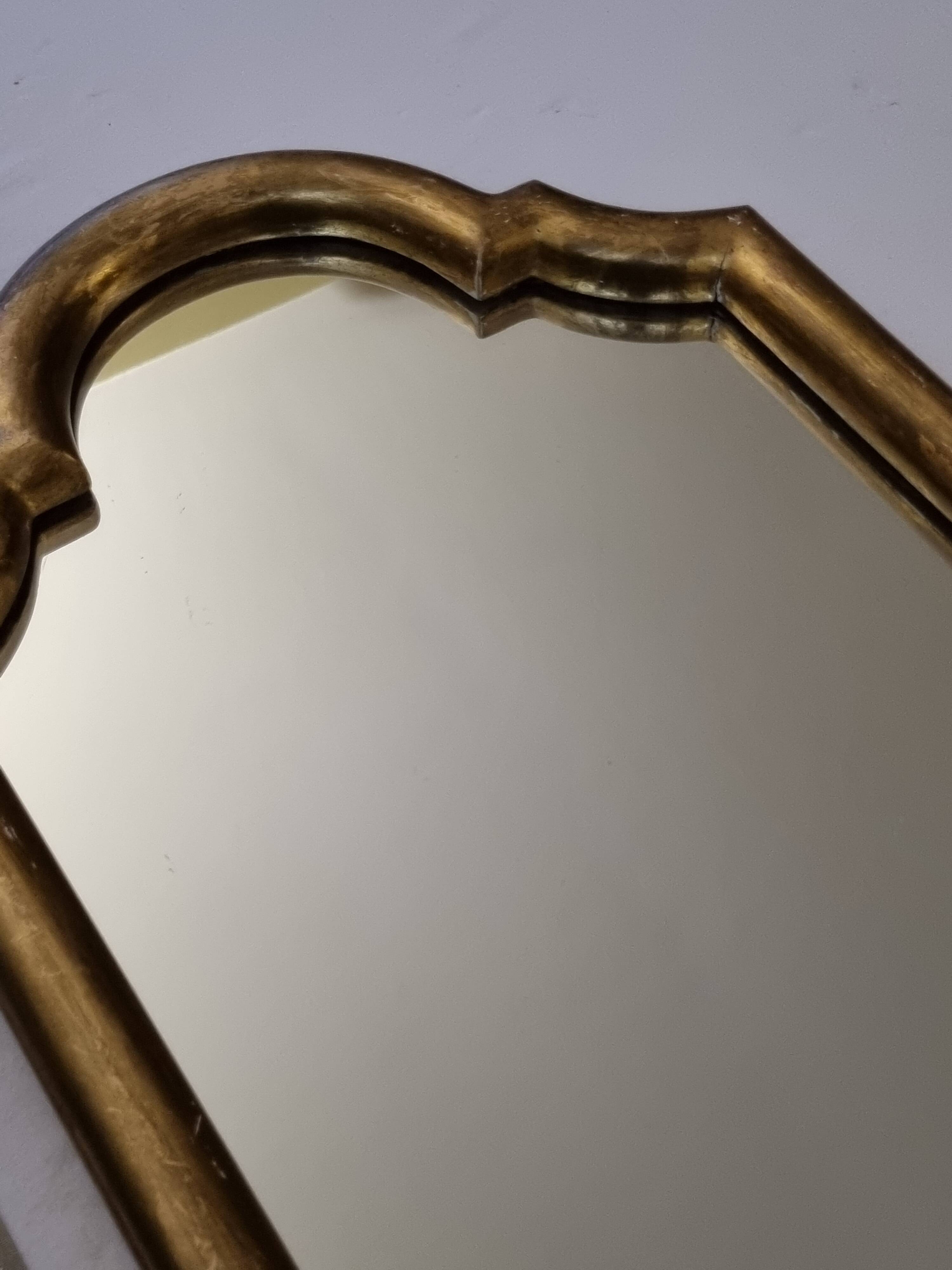 Wall mirror with a curved pediment in gilded wood, Louis-Philippe style, 44x30 cm