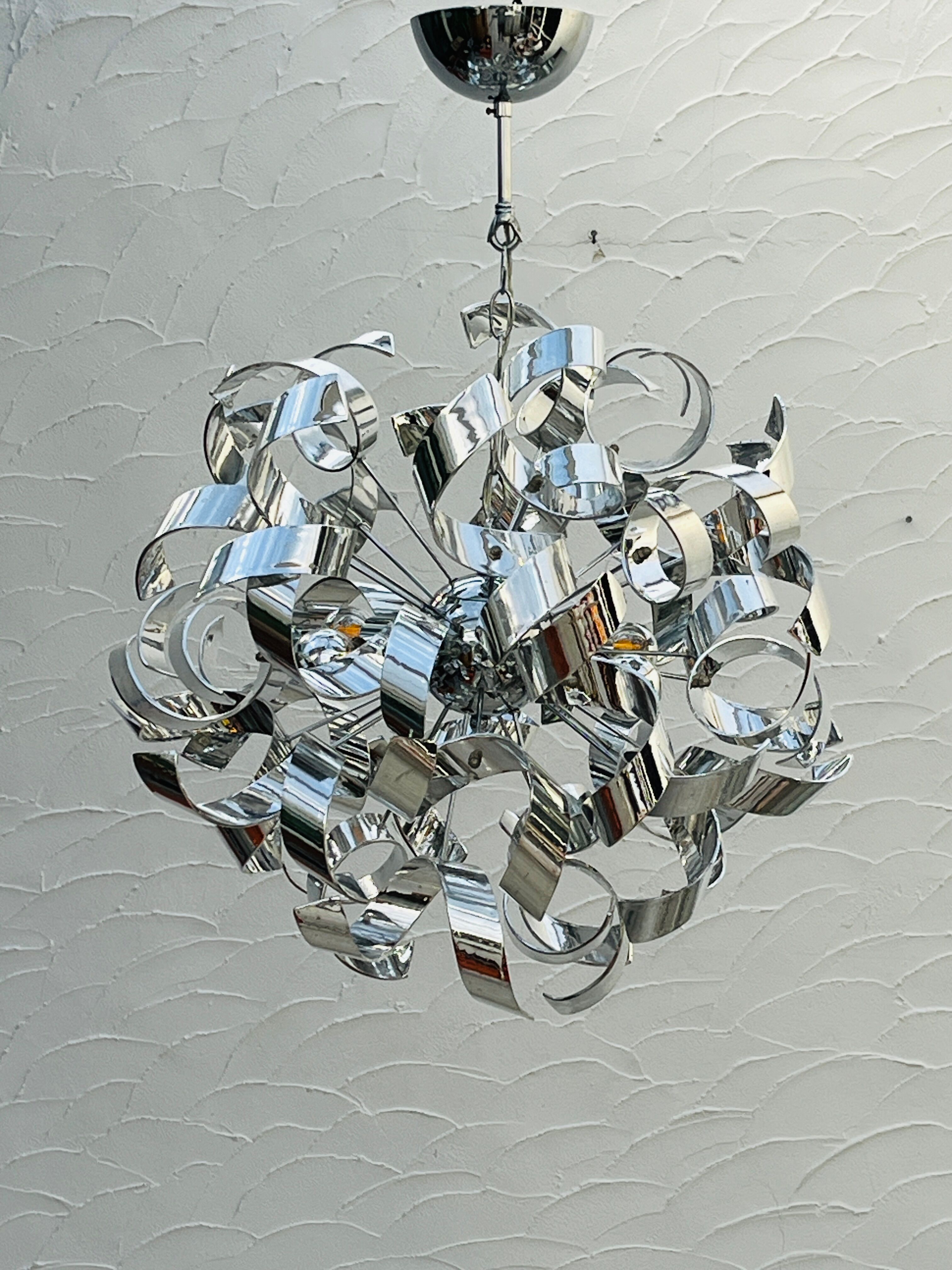 Sculptural chrome suspension design