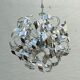 Sculptural chrome suspension design