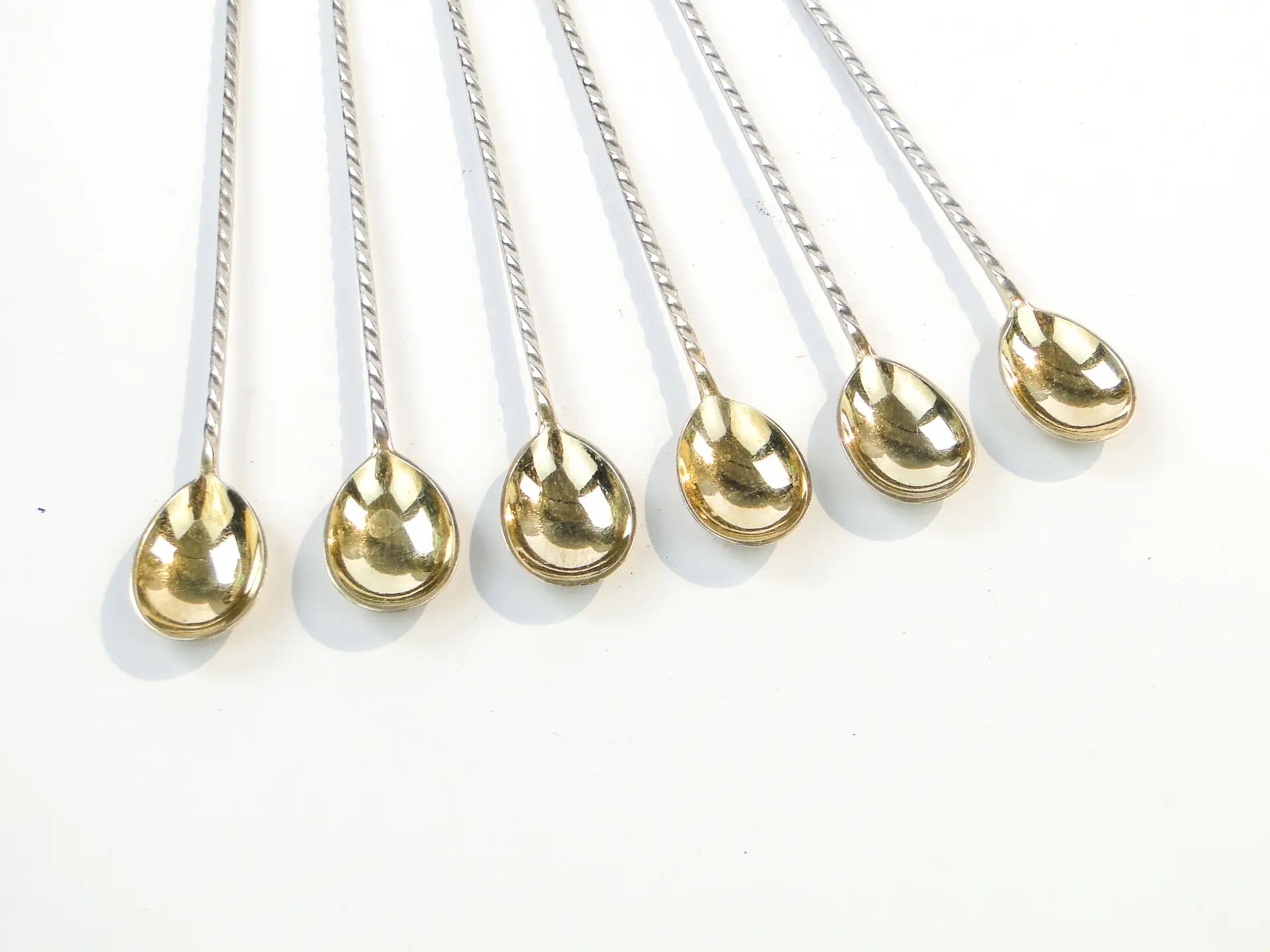 Set of neoclassical cocktail spoons, silver-plated brass, G.A.B., Sweden, 1930s