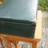 Green cardboard suitcase