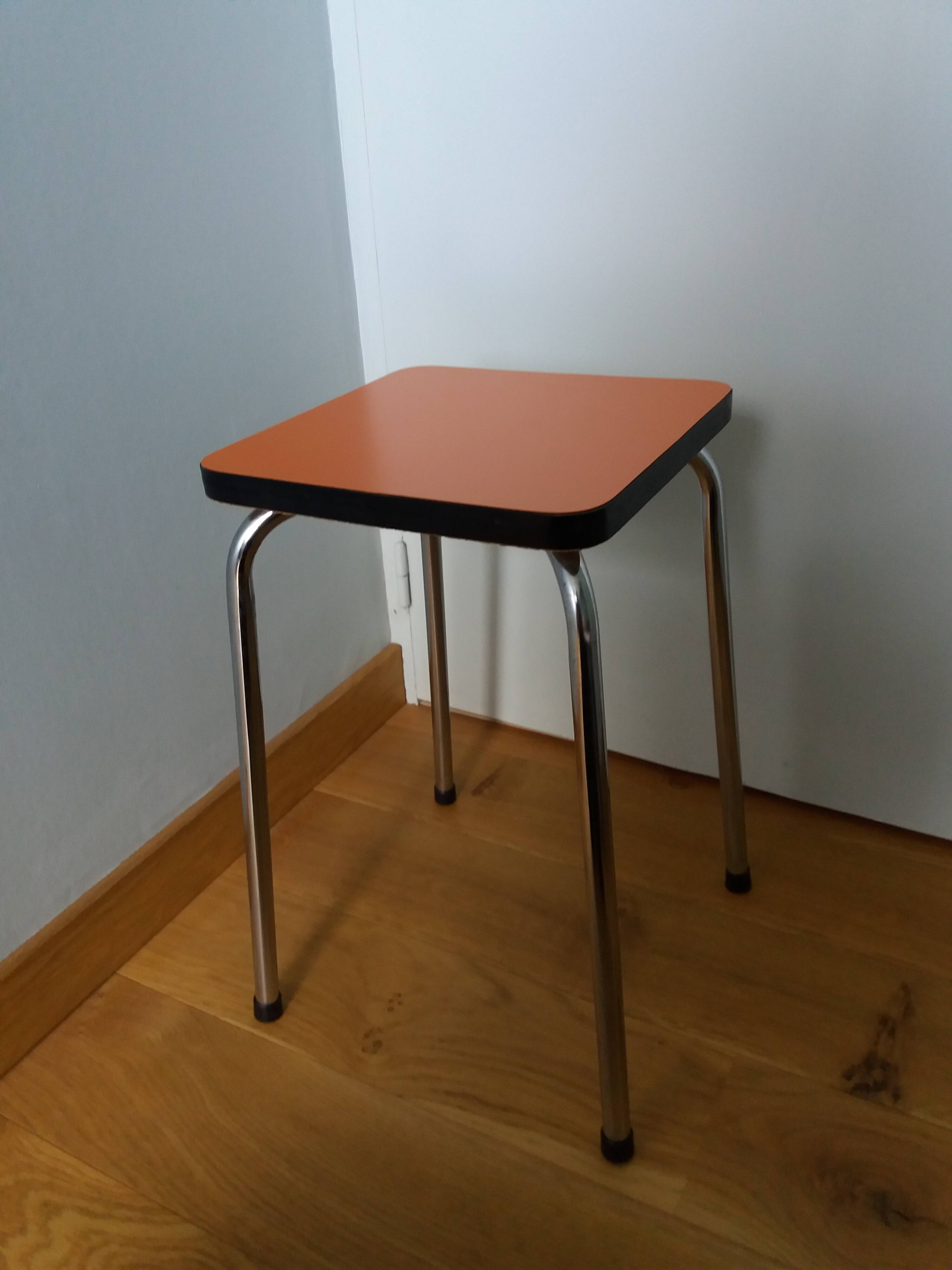 Chrome metal and orange formica stool