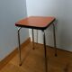Chrome metal and orange formica stool