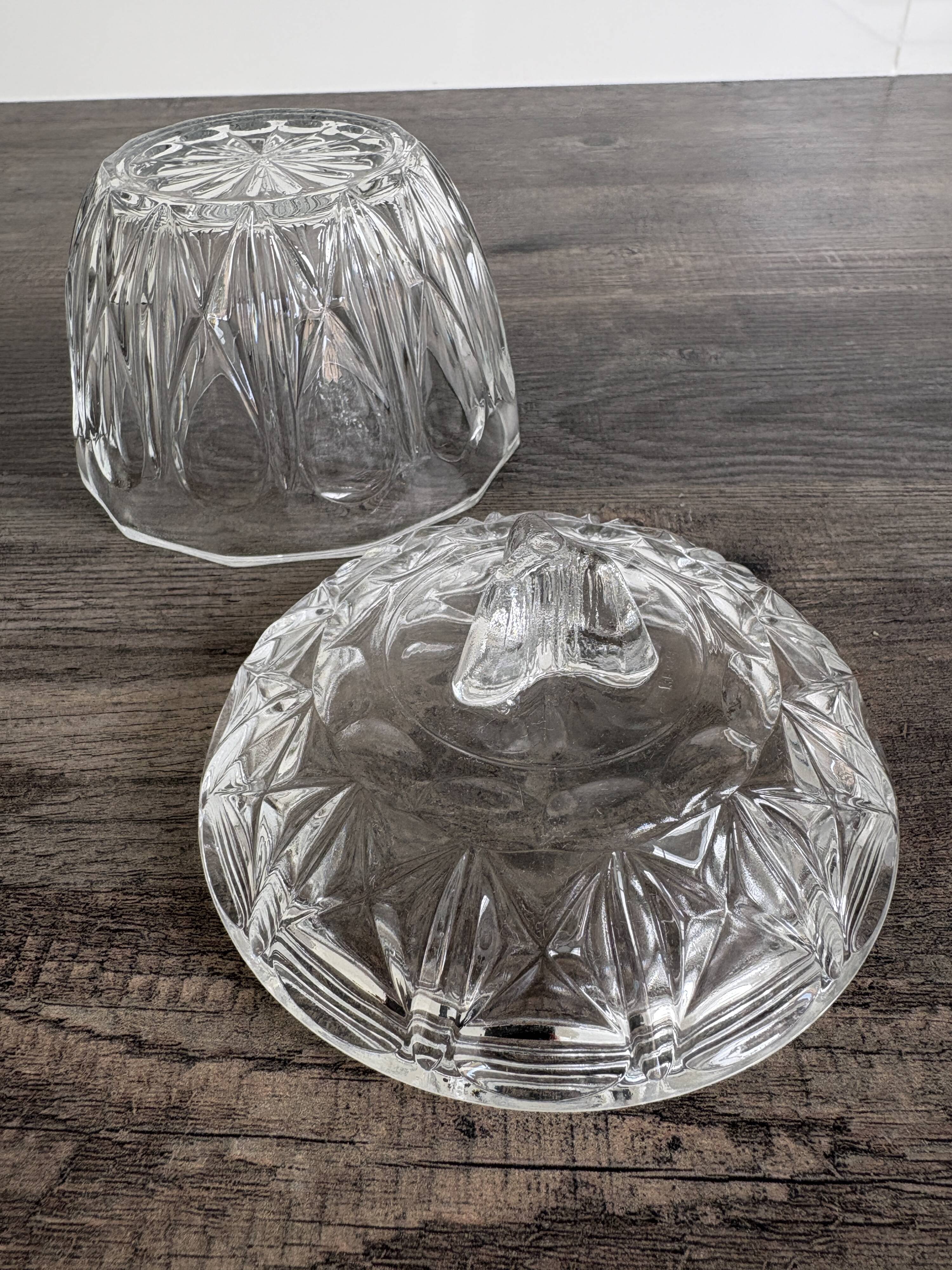 Antique covered jar in chiseled glass