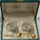 box of a pair of Baccarat crystal salerons with its 2 small golden spoons