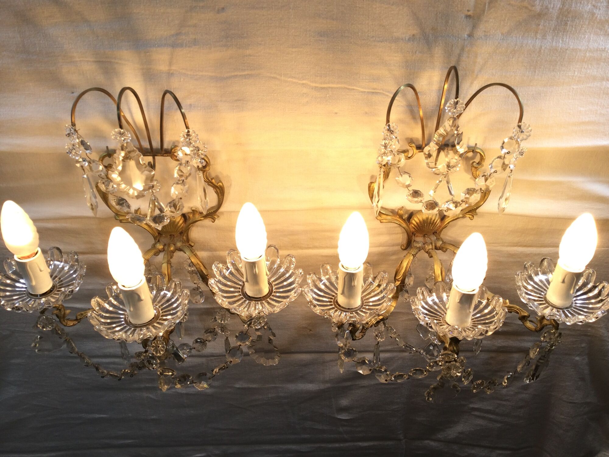 Pair of 3-light bronze and crystal wall lights