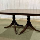 1950s English Regency walnut table with 1 extension leaf