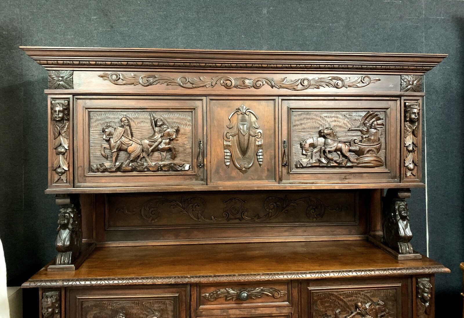 Wooden Renaissance hunting pavilion buffet made entirely carved with war attributes