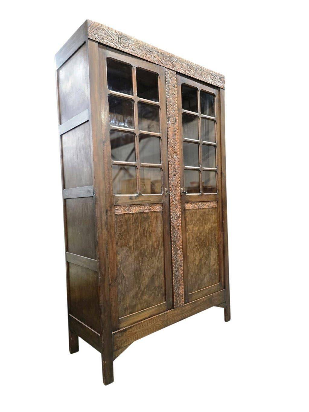 Vintage display cabinet/shelf in dark wood with glass.