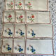 12 embroidered tea towels