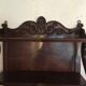 Carved wooden wall shelf.
