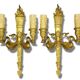Pair of large wall sconces, torch and swans, Empire style - gilded bronze