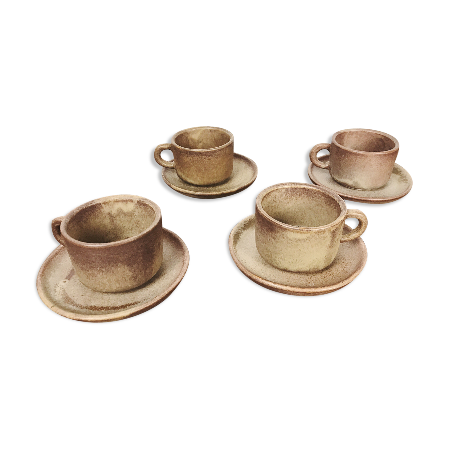 4 sandstone cups with under cups