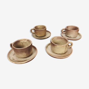 4 sandstone cups with under cups