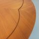Vintage English round teak coffee table from the 1960s