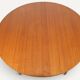 Round extendable dining table in teak – 1960s